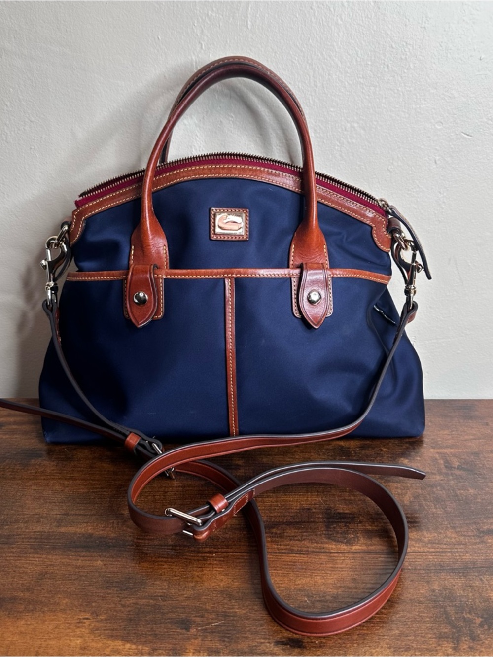 Dooney & Bourke Wayfarer Nylon Domed Satchel in blue with tan leather trim